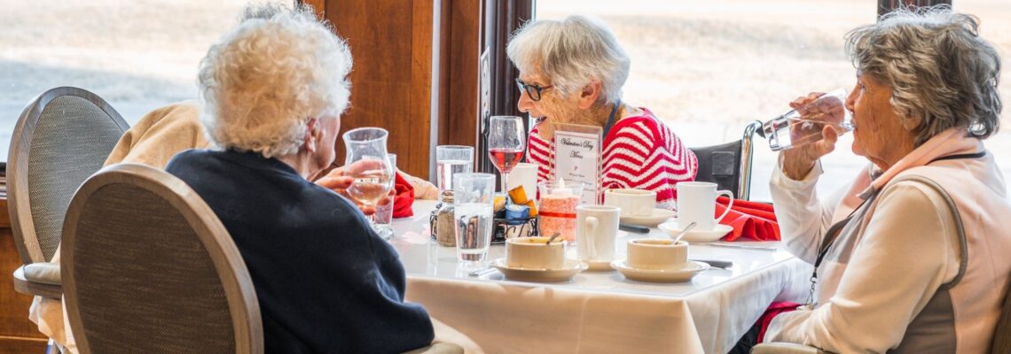 group of women enjoying food at parsons house