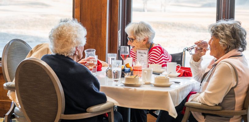 group of women enjoying food at parsons house